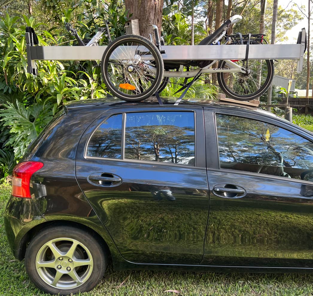 Trike on roof of city car